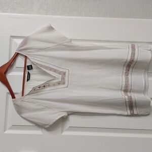 An Eddie Bauer white embroidered short sleeve blouse, size L